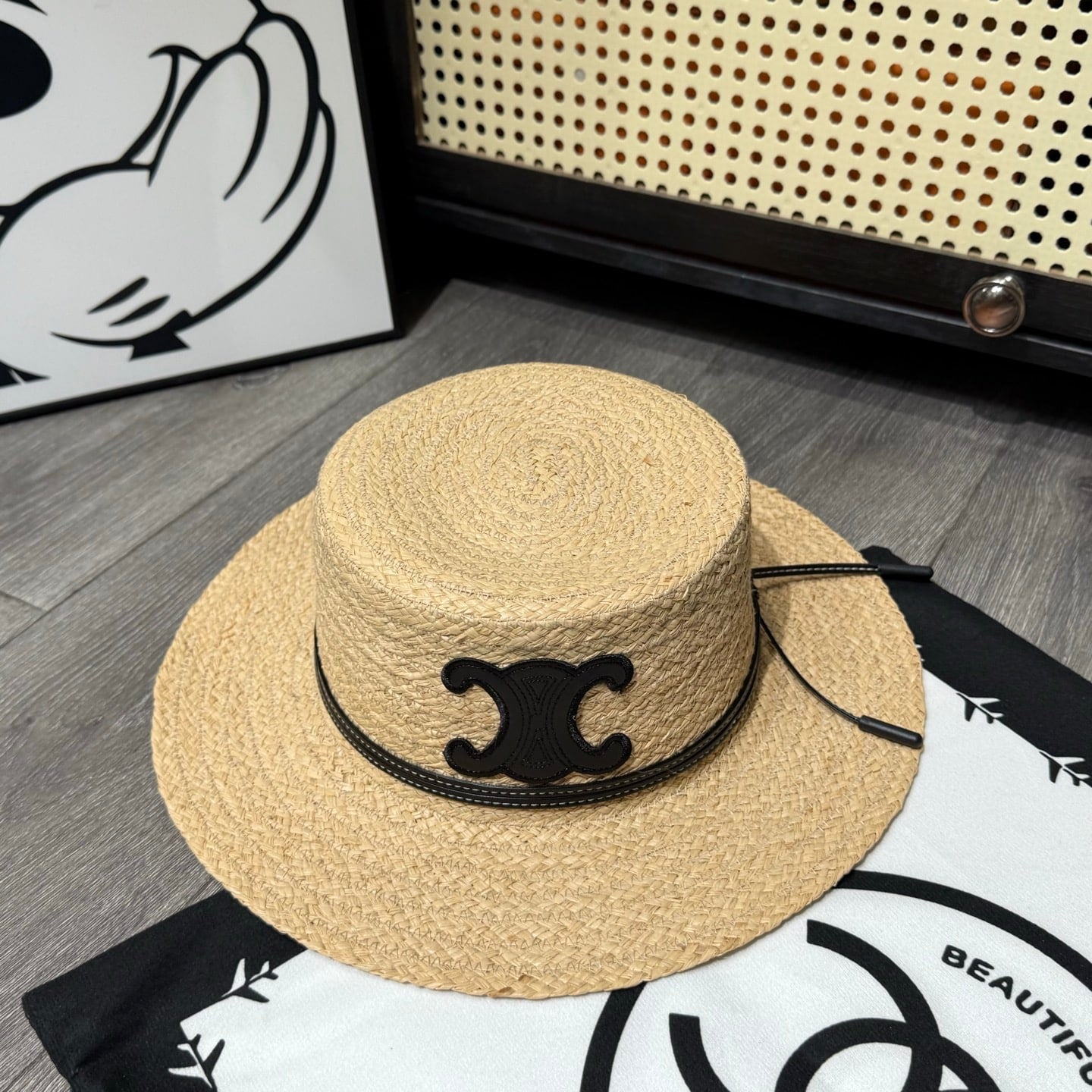 Ezyycart Bags CL FLAT CROWN RAFFIA HAT EMBLEM IN BLACK